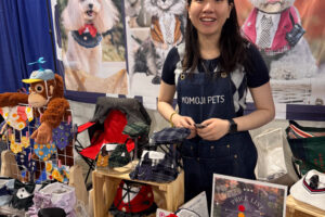 Momoji Pets booth featuring stylish uniforms for furry officers.